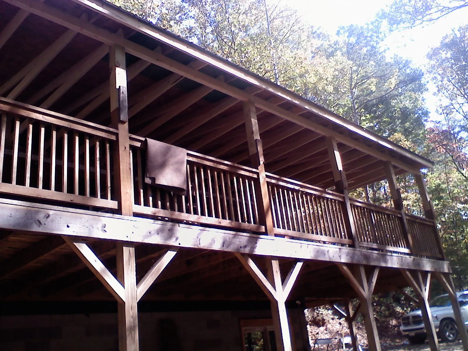 Timber framing under a new elevated porch and deck — Roof Leak Repair in Stone Park by Roofing Brothers